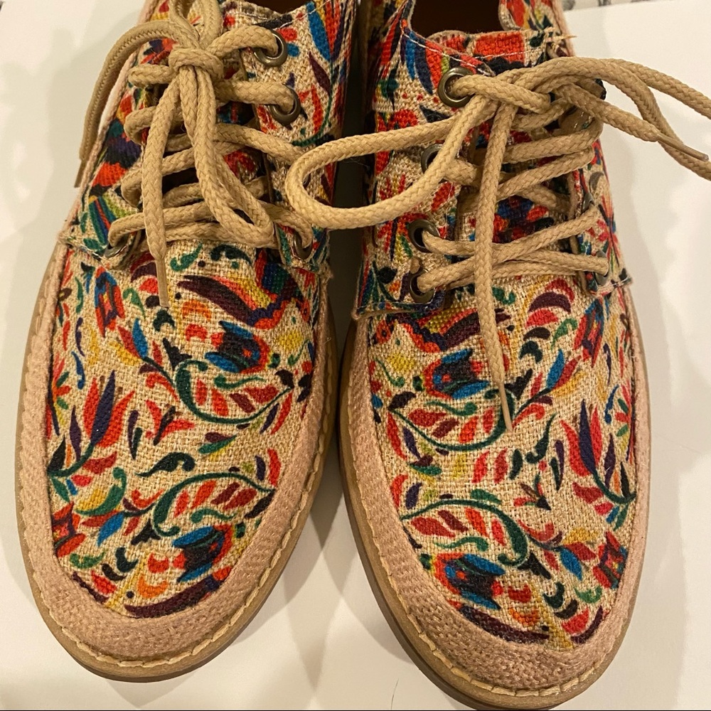 Handcrafted floral flats.